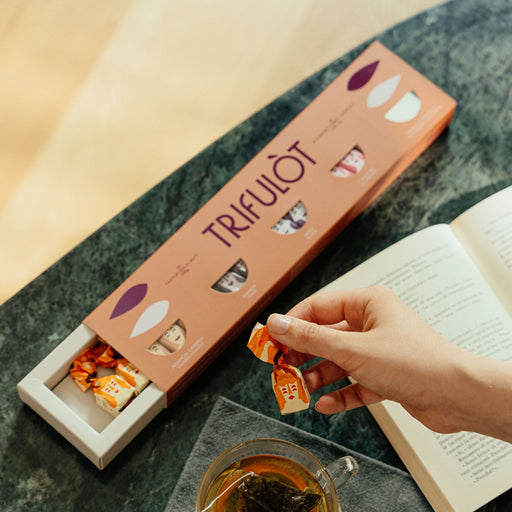 Indulge in a luxurious selection of sweet truffles, each crafted to perfection. A delightful treat for any occasion, perfect for gifting or savoring.