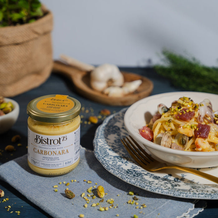 A jar of creamy Carbonara sauce infused with rich flavors for a delicious pasta dish.