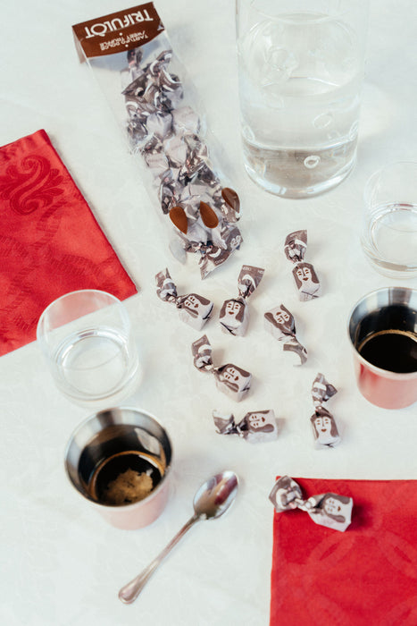 Delight in the smooth, rich cocoa of TartufLanghe Dark Chocolate Hazelnut Truffles, featuring the perfect pairing of 35% Piedmontese hazelnuts and premium dark chocolate. Each truffle is a little bite of indulgence, combining bold dark chocolate with the crunchy sweetness of hazelnuts.