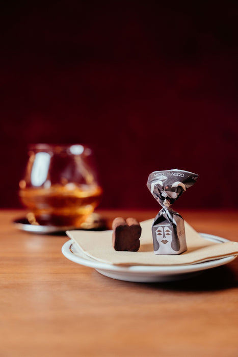Dive into the intense richness of TartufLanghe Dark Chocolate Truffles, made with premium dark chocolate and enhanced by 35% Piedmontese hazelnuts. Each bite offers a luxurious balance of smooth, bold cocoa and the satisfying crunch of hazelnuts, perfect for those who appreciate the finer things in life.
