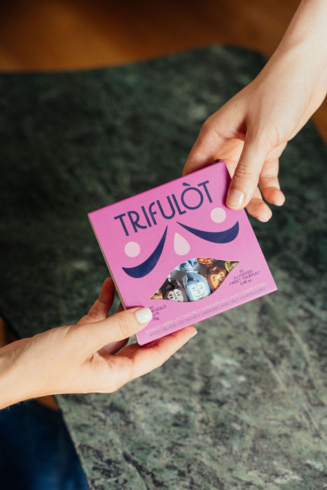 Indulge in the elegance of Trifulot sweet truffles – a harmonious selection of gourmet flavors, wrapped in chocolate perfection.