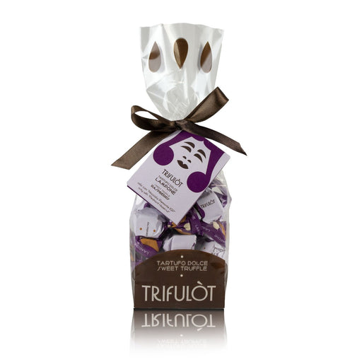 In this sweet truffle you can appreciate the classic taste of dark chocolate combined with the fruity one of raspberry. A delicious and innovative union enclosed in a beautiful gift wrapping! This delightful treat from Tartuflanghe features a delightful harmony of classic and innovative flavors. Each bite reveals a smooth and rich dark chocolate shell combing with vibrant raspberry.The careful selection of high-quality ingredients and meticulous craftsmanship create a truly  unique and satisfying chocolate.