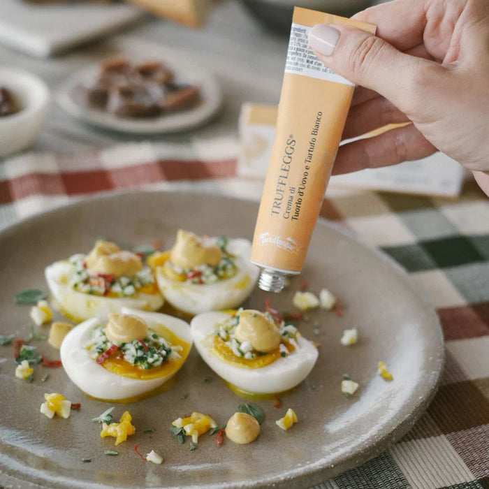 Truffle Egg Spread in Tube: A creamy blend of eggs and truffle, packed in a squeezable tube for easy use, perfect for spreading on toast, enhancing dishes, or adding a luxurious twist to your meals.