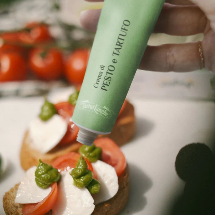 Pesto Truffle Spread in Tube by TartufLanghe: A delicious blend of pesto and truffle, packaged in a convenient squeezable tube, ideal for adding a gourmet touch to pastas, sandwiches, and appetizers.