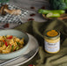 Premium Carbonara sauce in a jar, bringing authentic Italian flavor to your pasta.